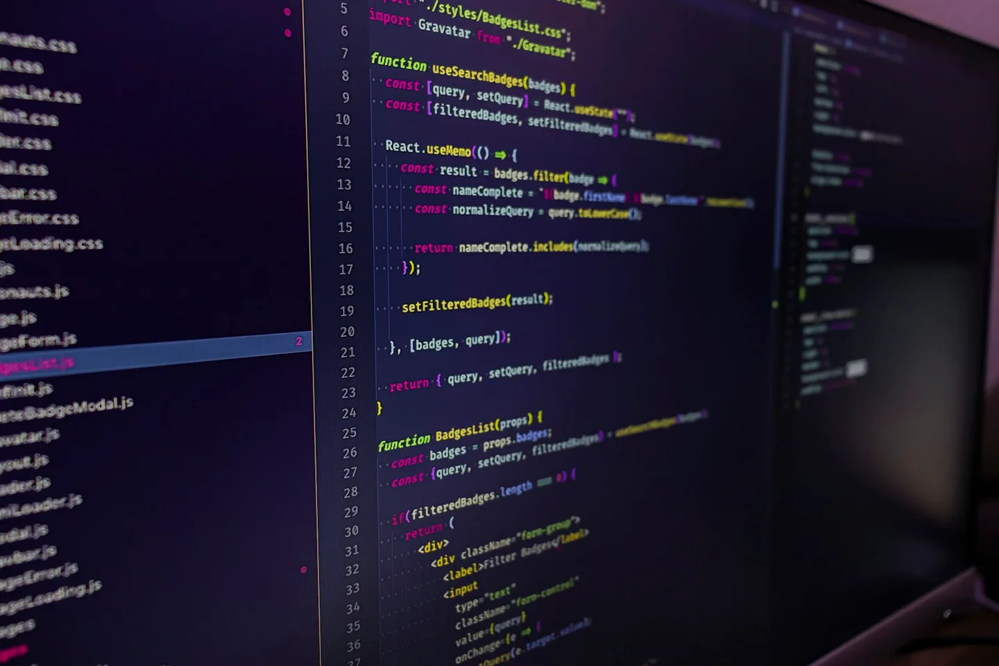 A close-up of JavaScript and React source code on a computer screen.